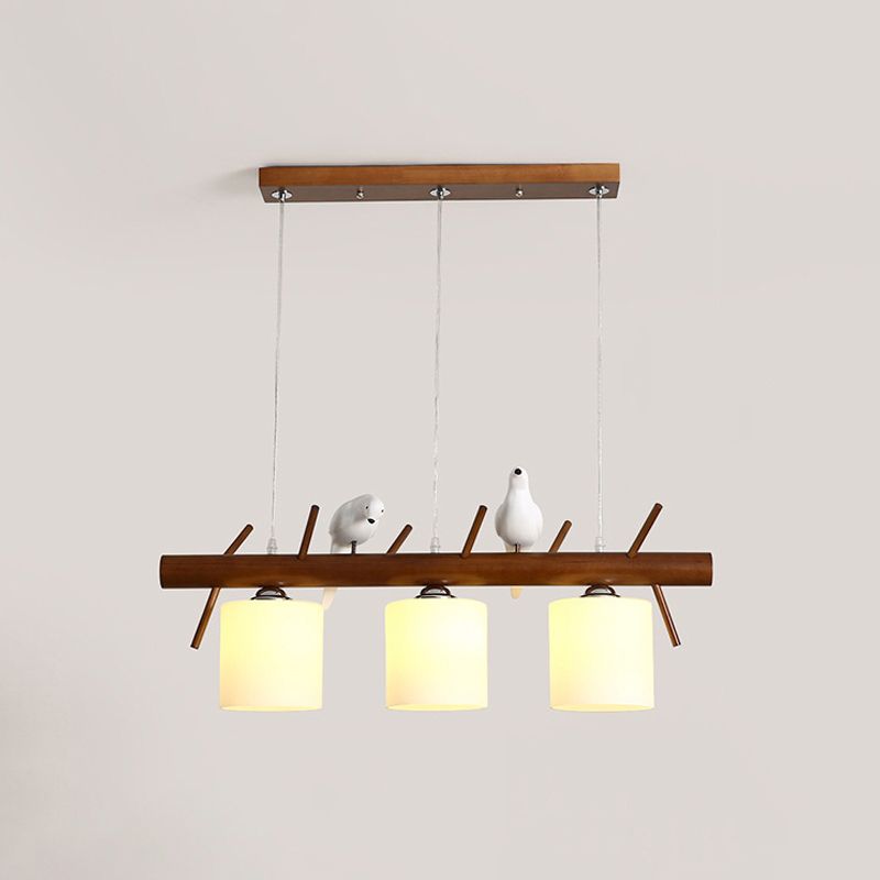 Cylinder Restaurant LED Pendant Light White Glass Simplicity Hanging Island Light with Resin Bird