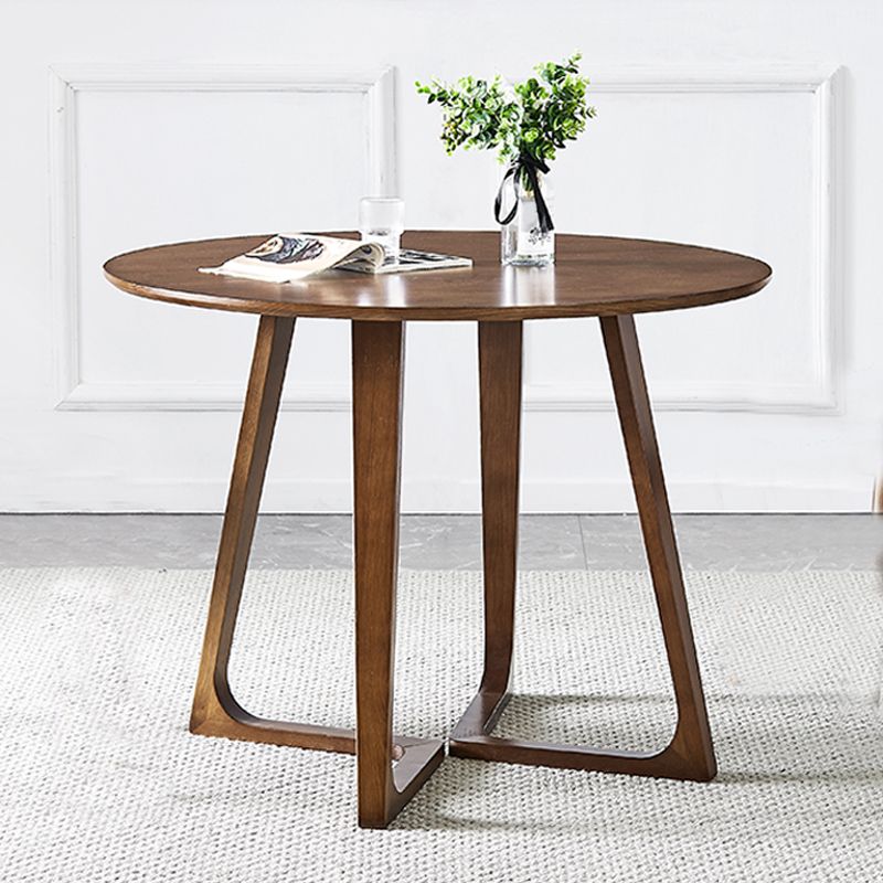 Mesa redonda de ashwood brown sencilicidad de doble pedestal para comedor