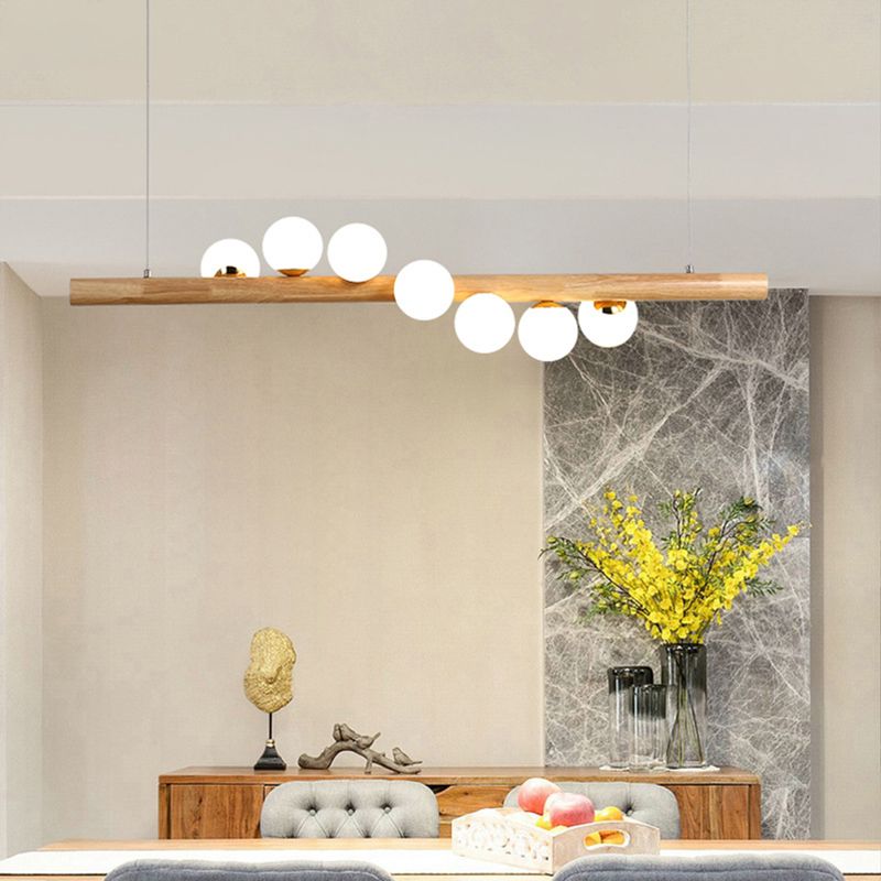 Ball Island Pendant Light Minimalist Cream Glass Restaurant LED Ceiling Light in Wood
