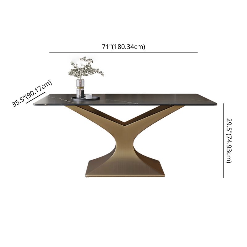 Ensemble de salle à manger minimaliste avec haut de table de pierre fritté et ensemble de table de base d'or