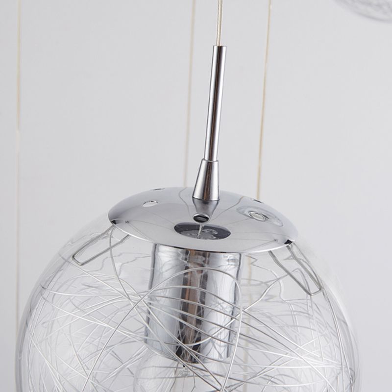 Lumière suspendue en argent dans la lampe suspendue du globe en acier inoxydable de style de luxe moderne pour les escaliers