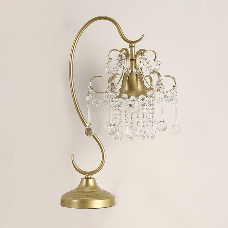 1 lampe de table à dos de bras plié la tête