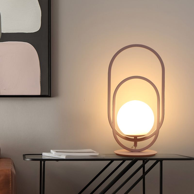 Lámpara de mesa de vidrio blanco global modernista 1 luz de lectura rosa con decoración oblonga doble