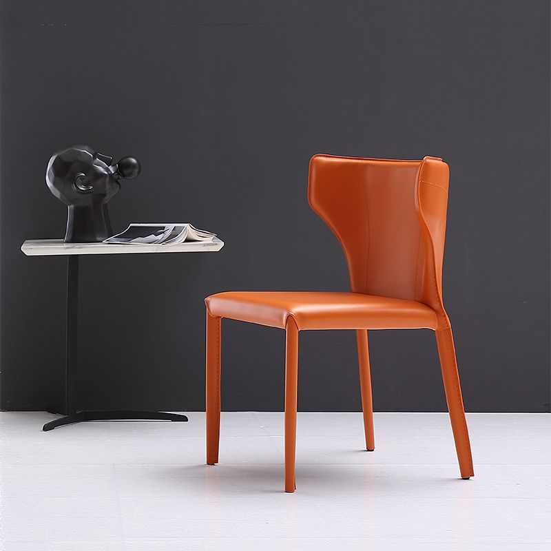 Silla lateral de comedor de cuero de estilo diseñador Silla de comedor Wingback para uso doméstico