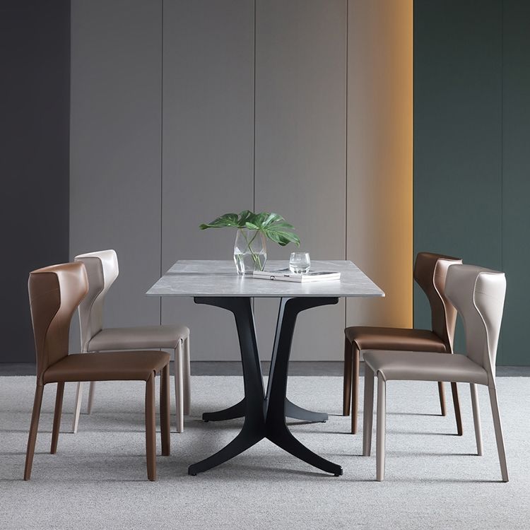 Silla lateral de comedor de cuero de estilo diseñador Silla de comedor Wingback para uso doméstico