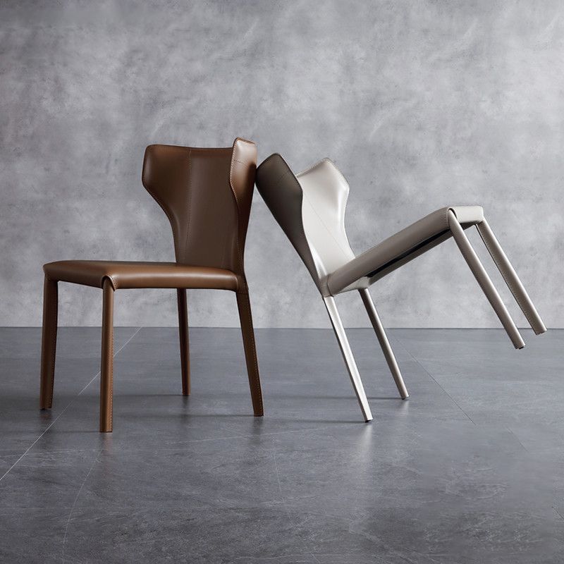 Silla lateral de comedor de cuero de estilo diseñador Silla de comedor Wingback para uso doméstico