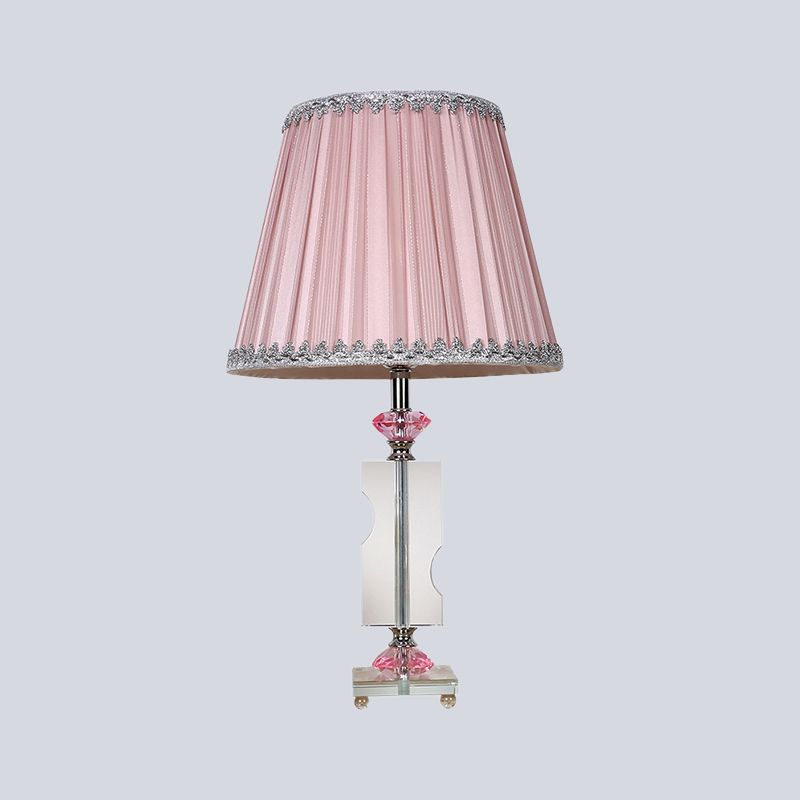 1 tête de salon de bureau modernisme modernisme table rose clair avec une teinte en tissu plissé