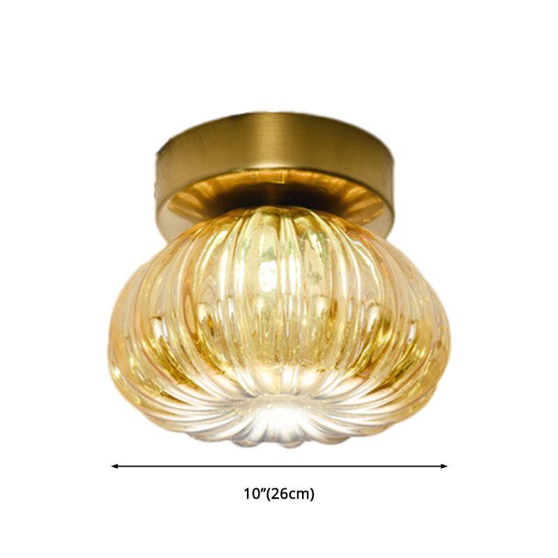 Plafonnier LED à tête unique en verre nervuré transparent/ambre à montage sphéroïde moderniste, 5,5"/11" de largeur