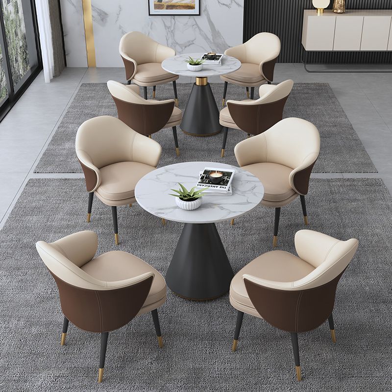 Eigentijdse stenen eettafel rond voetstuk huis keuken dinermeubilair