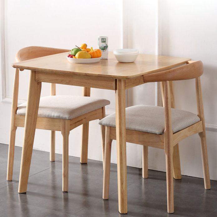 Square Holzfarbe Esstisch Industrial Solid Gummiwood 4 Beintisch für Esszimmer