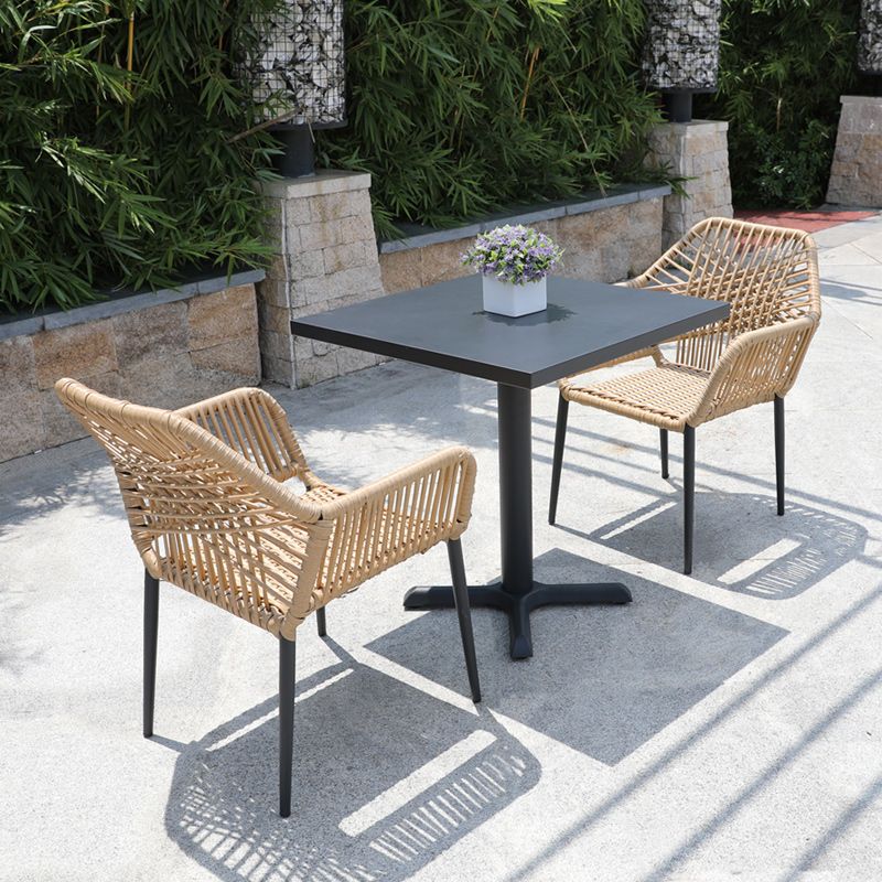 Tropical Outdoor Bistro Chairs with Arms in Faux Rattan and Metal Base
