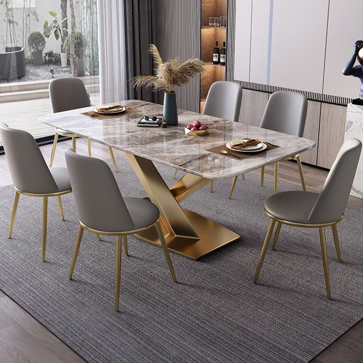 Mesa de comedor de lujo tradicional rectángulo mesa de piedra sinterizada gris con base de pedestal dorado