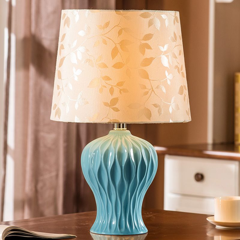 Leaf-Printed Fabric Beige Night Light Barrel Shade 1-Light Traditional Table Lighting with Blue Urn Base