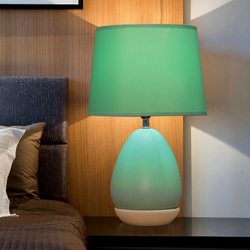Luce notturno a forma di uovo Ceramica moderna Ceramica moderna 1 tavolo blu lampada da tavolo con tonalità tamburo