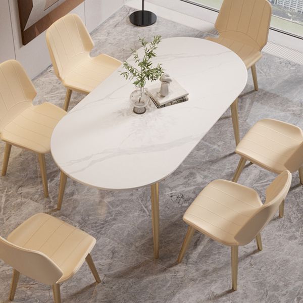 Table à manger ovale contemporaine Table à manger en pierre fritrée avec 4 jambes en métal pour salle à manger