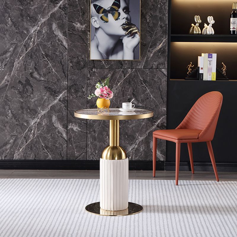 Mesa de comedor de piedra sinterizada de forma redonda, mesa con pedestal Glam para comedor