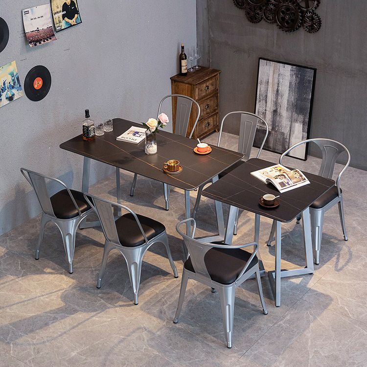 Industriële eettafel Zwart gesinterde stenen eettafel met dubbel voetstuk