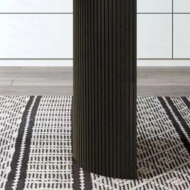 Table à manger en pierre fritrée de style moderne avec une double base de piédestal double