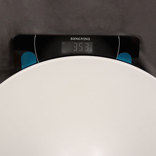 Dinettetafel in eigentijdse stijl, rond stenen meubilair met tulponderstel
