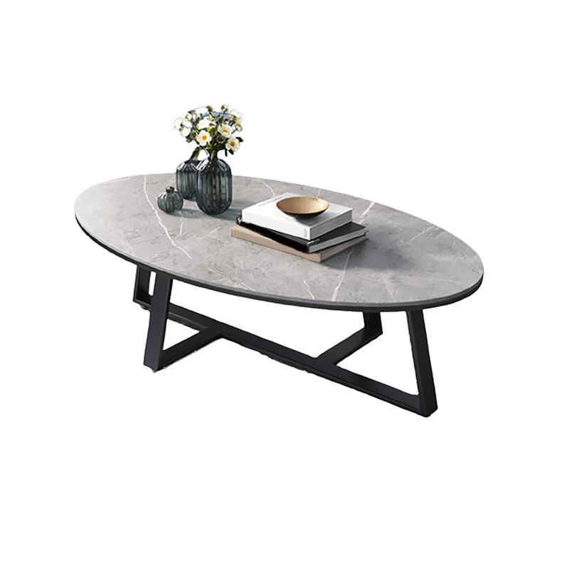 Glam Oval Top Coffee Table with Iron Cross Base and Stone Top