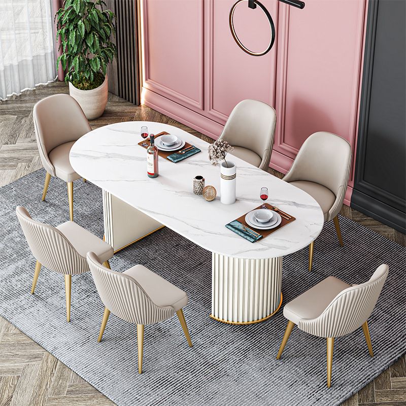 Ovaal gesinterde stenen eettafel moderne tafel in wit met metalen dubbele voetstukbasis