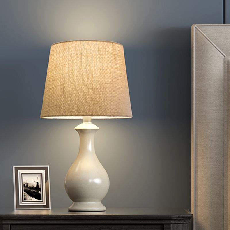 1 Bulb Conical Desk Lamp Countryside Beige Fabric Nightstand Light with White Vase Shape Base