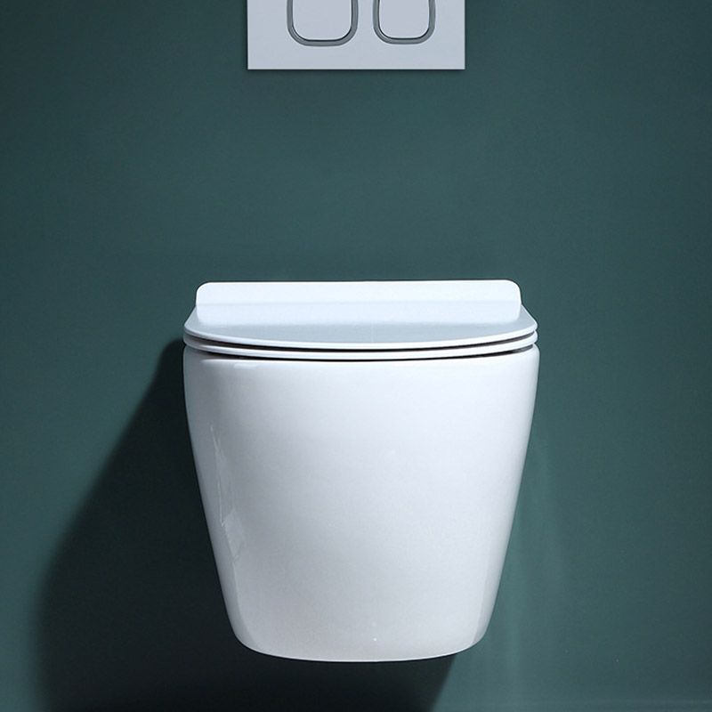 Modern Concealed Tank Toilet Skirted Ceramic Wall Hung Flush Toilet with Seat