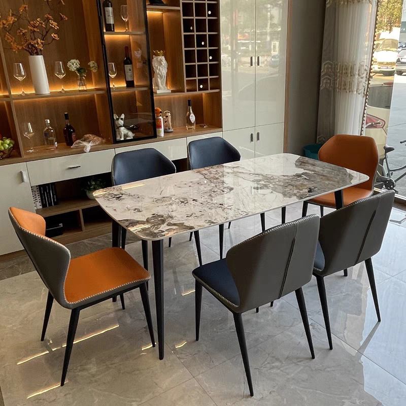 Contemporary Dining Set with Sintered Stone Dining Table and Cushioned Chairs