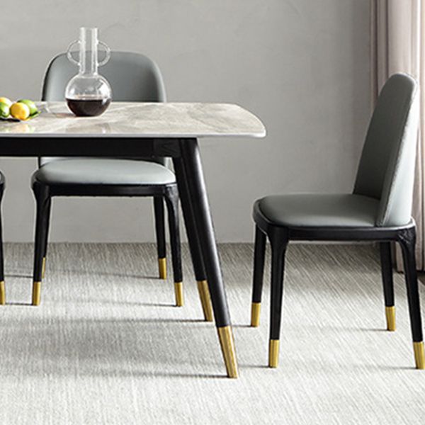 Mesa de comedor de piedra con 4 piernas negras