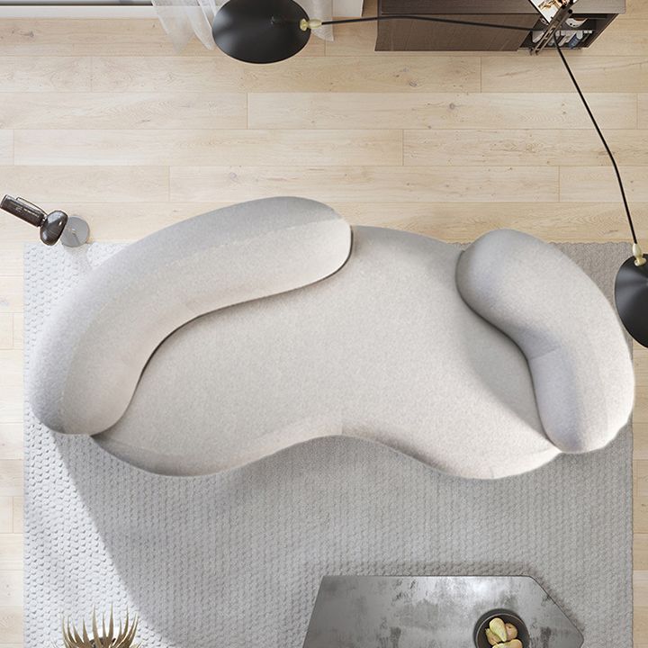 Ultra-Modern Beige Curved Sofa with Tuxedo Arm for Living Room