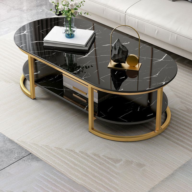 Contemporary Oval Glass Top Cocktail Table with Golden Base and Shelf
