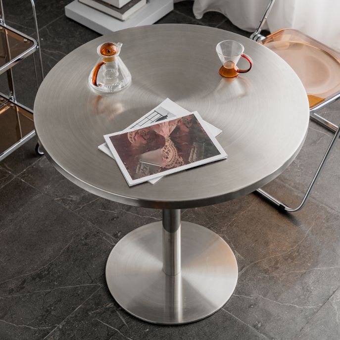 Mesa de comedor con astillas de metal Mesa de comedor de acero inoxidable con base de pedestal