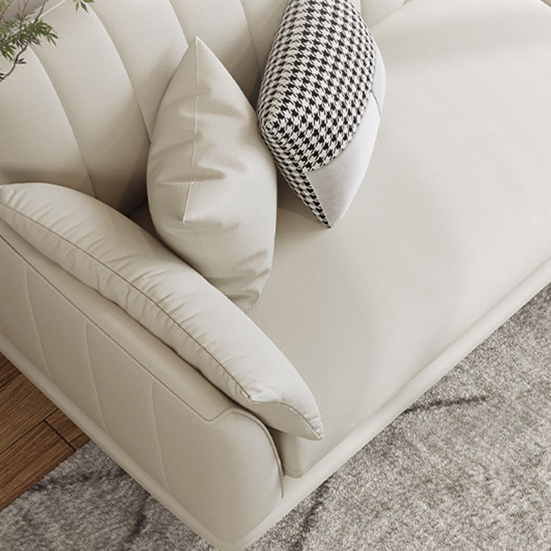 Sloped Arm Sofa with Chaise in White Sewn Pillow Back Faux Leather Sofa - 68.9" D