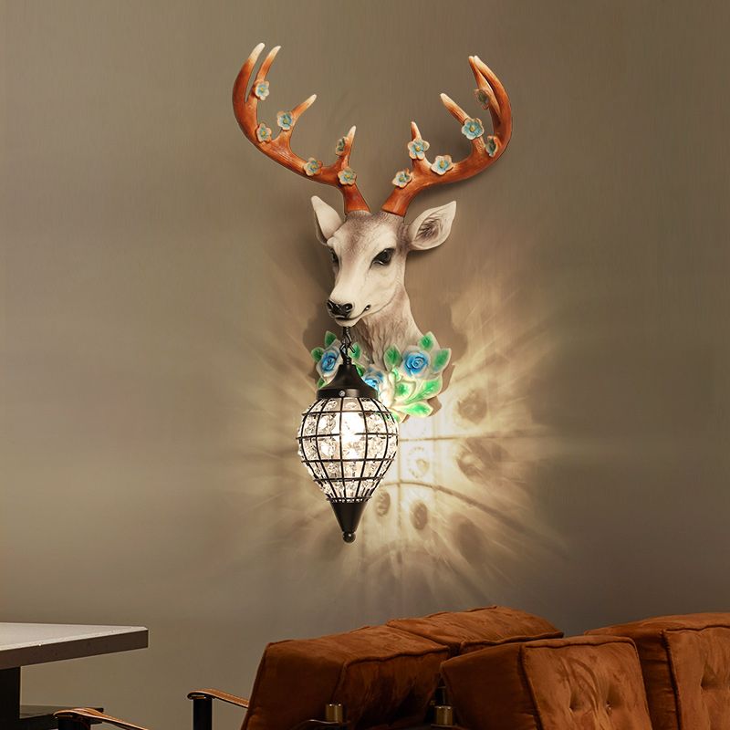 1-Licht-Elchkopf-Leuchter leichter Bauernhaus Schwarz/Weiß/schwarz-gelbes Harzwandlampe mit Blütendetail und Regentropfenkristallschatten