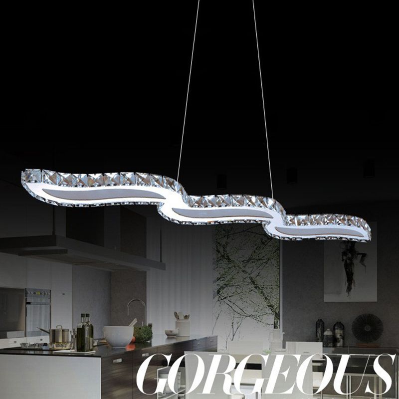 Moderno lussuoso lussuoso isola a pendente illuminazione ondata prismatica a soffitto di cristallo ottico per soggiorno
