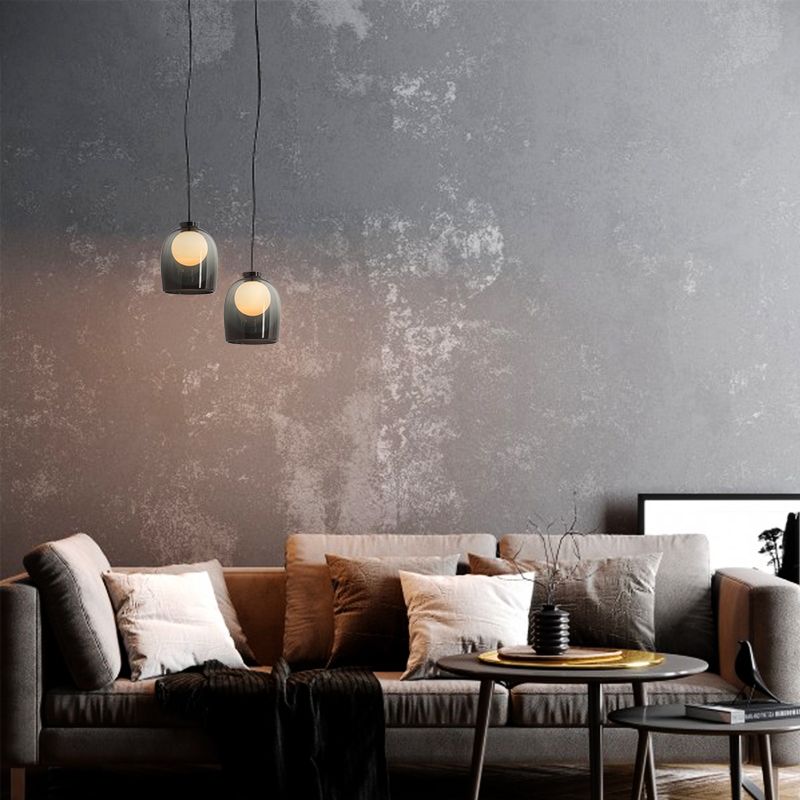 Lampe suspendue à la cloche en verre dans un pendentif en fer forgé moderne pour chambre à coucher