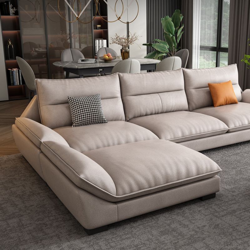 Flared Arm Beige Sectional Sofa with Chaise Pillowed Back Cushions Couch Sectional