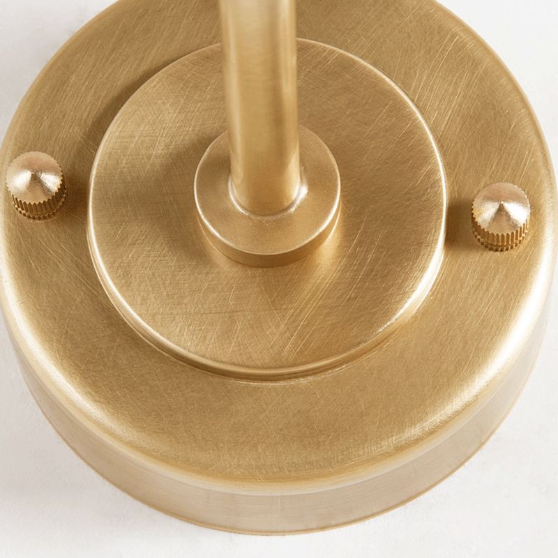 Brass Globe Wall Light Contemporary 1 Light Hand Blown Glass Sconce Light with Crossed Arm