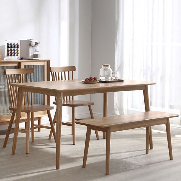 Eenvoudige bruine standaard eettafel vaste houten rechthoek eettafel met 4 potenbasis