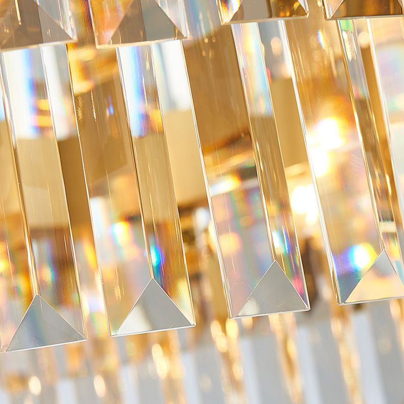 Postmoderne 12 Köpfe Deckenheizpendelleuchter hellgoldener trommeler Kronleuchterlampe mit dreiseitigem Kristallstab Farbton