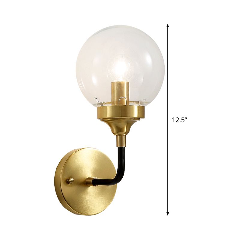 Simple Globe Wall Lighting Clear Glass 1 Bulb Sconce Light Fixture in Brass with Curved Arm