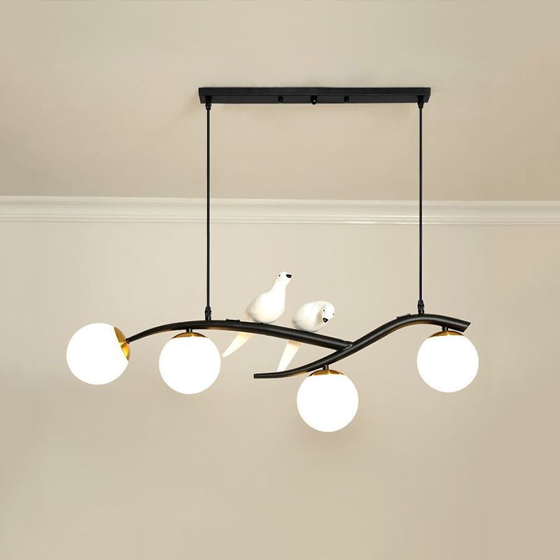 Glass Globe Island Light in Modern Singularity Wrought Iron Pendant Light with Resin Bird Decoration