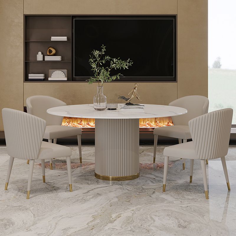 Mesa de comedor de piedra sinterizada mesa redonda de lujo con pedestal de metal en blanco