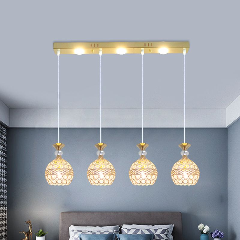 4 Köpfe Esszimmer Multi -Deckenleuchte modernistische Gold -Finish -Pendellampe mit Globuskristall eingebetteter Schatten