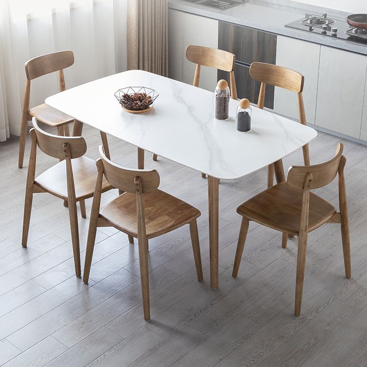 Eenvoudig gesinterde stenen eettafel 4 benen houten basis rechthoektafel voor thuis