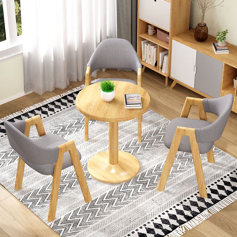 Silla de comedor tapizada escandinava con respaldo abierto y acabado mate (juego de 4)