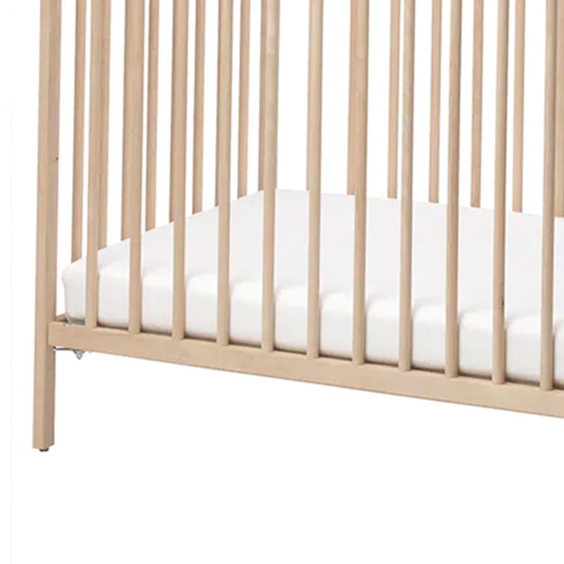 Traditional Nursery Crib with Adjustable Height in Natural Wood