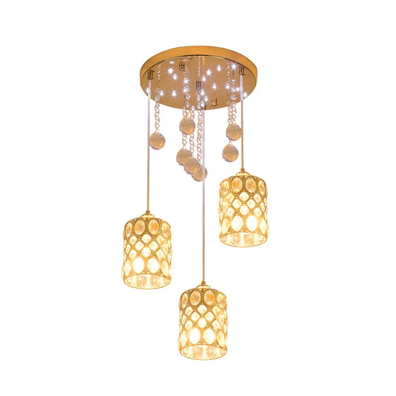Semplice lampada cilindrica inserita in cristallo appeso a 3 luci cluster ciondolo in oro per camera da letto