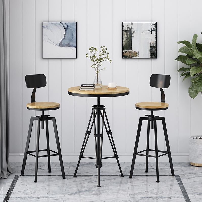 Industrielle höhenverstellbare schwarze Barhocker aus Eisen und Holz mit rundem Sitz