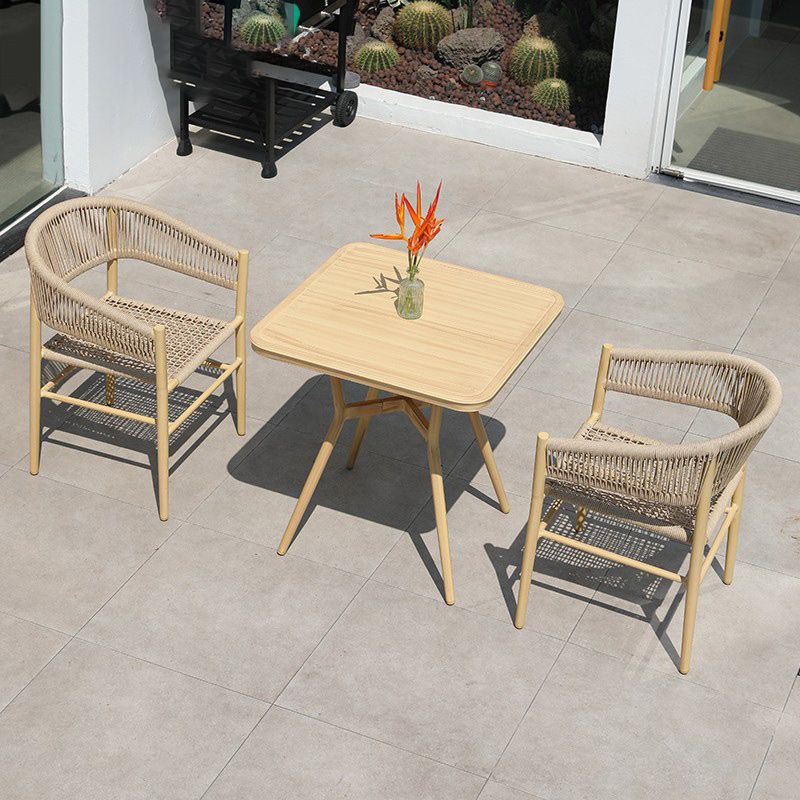 Contemporary Natural Patio Dining Side Chair with Faux Rattan Back